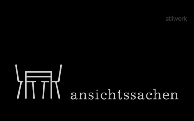 Icon Tisch mit zwei Stühlen in weiss uaf schwarz, daneben Text ansichtssachen